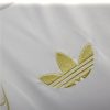tunique-real-madrid-design-dragon-or-pour-supporter-du-club-version-collector-2425 supportrartröja Real Madrid design gulddrake för klubbens fans collectorsversion 2425