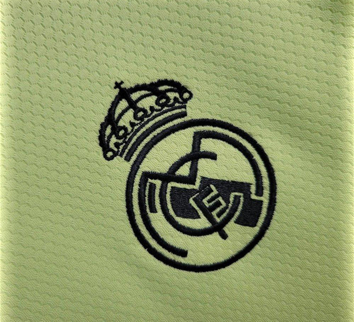 Real Madrid målvaktströja grön utgåva 2024-2025 tygdetalj