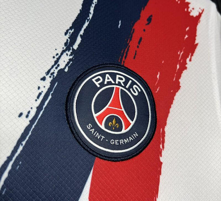 Paris Saint-Germain bortatröja vit utgåva 2024-2025 tygdetalj