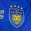 maillotkoreabizzlogo.jpg Fotbollströja Ulsan Hyundai Hemma 2024-2025 tygdetalj