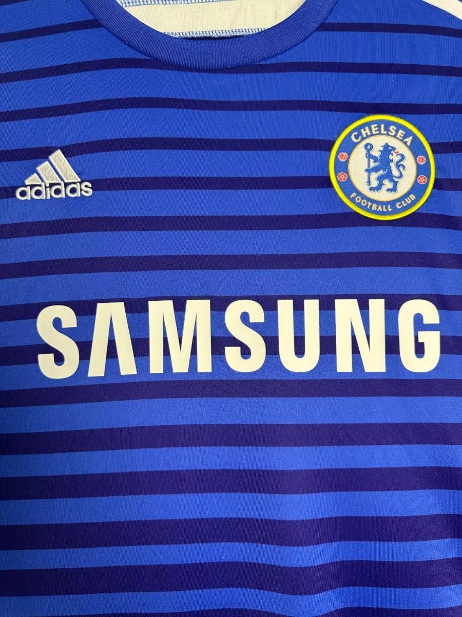 maillot-domicile-chelsea-fc-saison-2014-2015-bleu-officiel Hemmatröja Chelsea FC säsongen 2014-2015 blå officiell
