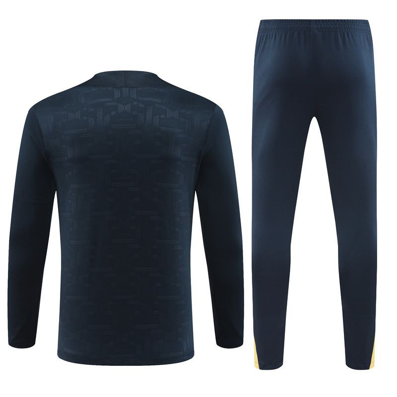 tenue-de-sport-fc-barcelone-veste-et-pantalon-jogging-pour-supporter FC Barcelonas sportkläder jacka och joggingbyxor för supporter