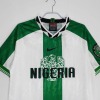 8C7ACAD3-F15D-4DE2-82DA-6F95C8020619.jpg Nigeria Bortatröja 1996